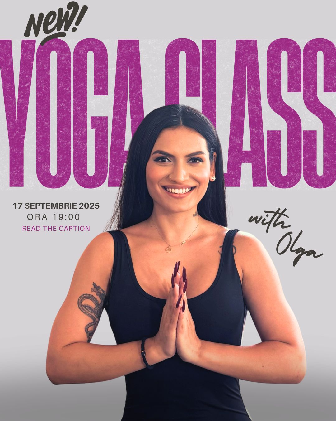 a woman with her hands clasped in front of her chest